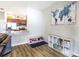 Bright Gathering room features built-in shelving and kitchen views at 304 Gardenia Ave, Debary, FL 32713