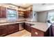 Modern kitchen with stainless steel appliances and granite countertops at 304 Gardenia Ave, Debary, FL 32713