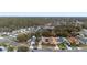 Aerial view of houses and neighborhood at 3125 Wood Rose Way, Deltona, FL 32725