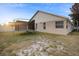 Large backyard with trampoline and home view at 3125 Wood Rose Way, Deltona, FL 32725