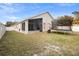 Large backyard with trampoline and screened porch at 3125 Wood Rose Way, Deltona, FL 32725