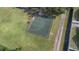 A full basketball court provides a perfect space for friendly games and community activities at 3125 Wood Rose Way, Deltona, FL 32725
