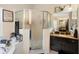 Main bathroom with granite vanity and walk-in shower at 3125 Wood Rose Way, Deltona, FL 32725