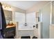 Main bathroom with corner bathtub and walk-in shower at 3125 Wood Rose Way, Deltona, FL 32725