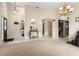 Bright and spacious entryway with high ceilings and views into the kitchen at 3125 Wood Rose Way, Deltona, FL 32725
