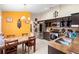 Eat-in kitchen with dark wood cabinets and stainless steel appliances at 3125 Wood Rose Way, Deltona, FL 32725