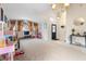Spacious living room with large windows and high ceilings at 3125 Wood Rose Way, Deltona, FL 32725