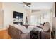 Relaxing living room with large TV and sliding doors to patio at 3125 Wood Rose Way, Deltona, FL 32725