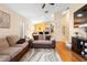 Open concept living room with a view into the kitchen and dining area at 3125 Wood Rose Way, Deltona, FL 32725