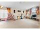 Spacious living room with ample natural light and high ceilings at 3125 Wood Rose Way, Deltona, FL 32725