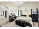 Main bedroom with a king-sized bed and a walk-in closet at 3125 Wood Rose Way, Deltona, FL 32725