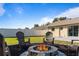 Relaxing backyard with firepit and seating area at 373 Blythville Ave, Deltona, FL 32725