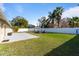 Spacious backyard, patio, firepit, and trampoline at 373 Blythville Ave, Deltona, FL 32725