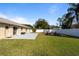 Large backyard with patio and firepit at 373 Blythville Ave, Deltona, FL 32725