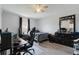 Bright bedroom with a gaming setup and ample closet space at 373 Blythville Ave, Deltona, FL 32725