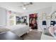 Bright bedroom with a queen-size bed and ample closet space at 373 Blythville Ave, Deltona, FL 32725