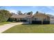 House exterior with landscaping and driveway at 373 Blythville Ave, Deltona, FL 32725