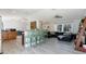 Modern kitchen with light wood cabinets and a breakfast bar at 373 Blythville Ave, Deltona, FL 32725