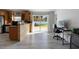 Kitchen with breakfast bar, view of backyard, and workspace at 373 Blythville Ave, Deltona, FL 32725