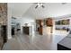 Open concept living space with kitchen and dining area at 373 Blythville Ave, Deltona, FL 32725