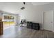 Open living area with laminate floor and backyard access at 373 Blythville Ave, Deltona, FL 32725