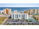 Aerial view of condo building, showing oceanfront location and amenities at 3800 S Atlantic Ave # 5040, Daytona Beach, FL 32118