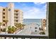 Ocean view from balcony, featuring beach and buildings at 3800 S Atlantic Ave # 5040, Daytona Beach, FL 32118