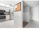 Kitchen with stainless steel appliances and white cabinets at 3800 S Atlantic Ave # 5040, Daytona Beach, FL 32118