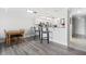 Bright kitchen and dining area with breakfast bar and wood flooring at 3800 S Atlantic Ave # 5040, Daytona Beach, FL 32118