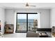 Living room with ocean view and sliding glass doors at 3800 S Atlantic Ave # 5040, Daytona Beach, FL 32118