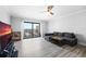 Bright living room with ocean view, comfy sectional sofa, and wood-look floors at 3800 S Atlantic Ave # 5040, Daytona Beach, FL 32118