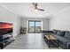 Bright living room with ocean view, comfy sectional sofa, and wood-look floors at 3800 S Atlantic Ave # 5040, Daytona Beach, FL 32118