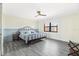 Spacious bedroom with a neutral color scheme and a large window at 3800 S Atlantic Ave # 5040, Daytona Beach, FL 32118