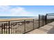 Private beach access with a gate at 395 S Atlantic Ave # 301, Ormond Beach, FL 32176