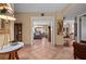 Bright entryway with tile flooring and views into the living areas at 395 S Atlantic Ave # 301, Ormond Beach, FL 32176