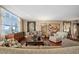 Living room with hardwood floors, comfy sofas and ocean view at 395 S Atlantic Ave # 301, Ormond Beach, FL 32176