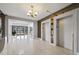 Building lobby with elevators and access to the outside at 395 S Atlantic Ave # 301, Ormond Beach, FL 32176