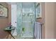 Walk-in shower with glass enclosure and updated tile at 395 S Atlantic Ave # 301, Ormond Beach, FL 32176