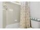 Clean bathroom with shower/tub combo and updated vanity at 418 Brookfield Ter, Deland, FL 32724