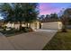 Attractive single-story home with a two-car garage and landscaped front yard at 462 Tuscany Chase Dr, Daytona Beach, FL 32117