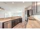 Modern kitchen with stainless steel appliances and granite countertops at 462 Tuscany Chase Dr, Daytona Beach, FL 32117