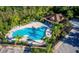 Community pool with a covered patio and plenty of lounge chairs at 462 Tuscany Chase Dr, Daytona Beach, FL 32117