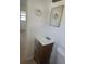 Small bathroom with vanity, toilet and mirror at 5108 Cassatt Ave, Orlando, FL 32808