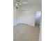 Bedroom with tile floors, double-door closet and bathroom access at 5108 Cassatt Ave, Orlando, FL 32808