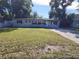 Front view of a single-story house with a lawn at 5108 Cassatt Ave, Orlando, FL 32808