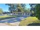 Ranch-style home with a spacious yard and driveway at 5108 Cassatt Ave, Orlando, FL 32808