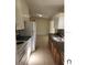 Efficient kitchen featuring wood cabinets and appliances at 5108 Cassatt Ave, Orlando, FL 32808