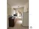 Simple kitchen with light cabinets and tile floor at 5108 Cassatt Ave, Orlando, FL 32808