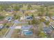 Aerial view of neighborhood homes near golf course and ponds at 559 Eagle Dr, Daytona Beach, FL 32117