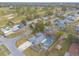 Aerial view highlighting the home's pool and surrounding neighborhood at 559 Eagle Dr, Daytona Beach, FL 32117